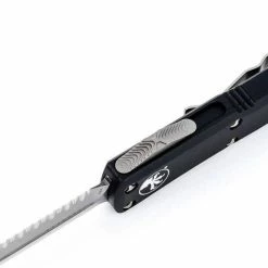 Microtech 232-12 UTX-85 D/E Black Handle Full Serrations Blade 7 Microtech 232-12 UTX-85 D/E Black Handle Full Serrations Blade