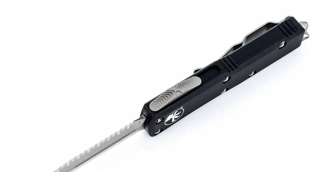 Microtech 232-12 UTX-85 D/E Black Handle Full Serrations Blade 5 Microtech 232-12 UTX-85 D/E Black Handle Full Serrations Blade